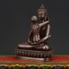 Left side view of Buddha Samantabhadra Statue handcrafted in Nepal, displaying meditative posture and sacred motifs.