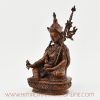 Left side view of Guru Rinpoche Figurine with traditional Tibetan Buddhist iconography