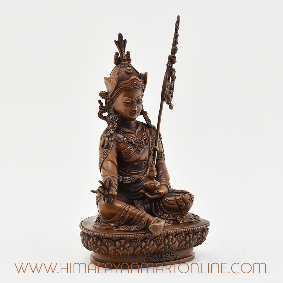 Right side view of Guru Rinpoche Figurine with detailed hand-carved features