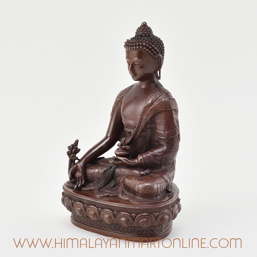 Left view of the Medicine Buddha Figurine in oxidized copper finish.