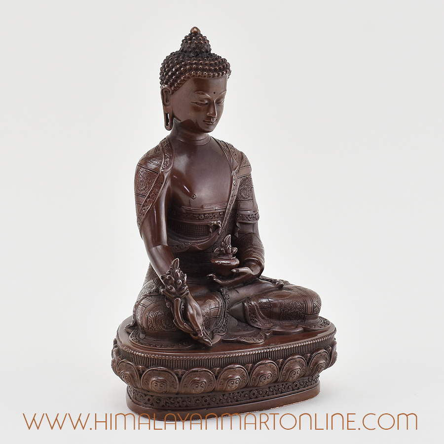 Right-side angle of Medicine Buddha Figurine with detailed posture and carving.