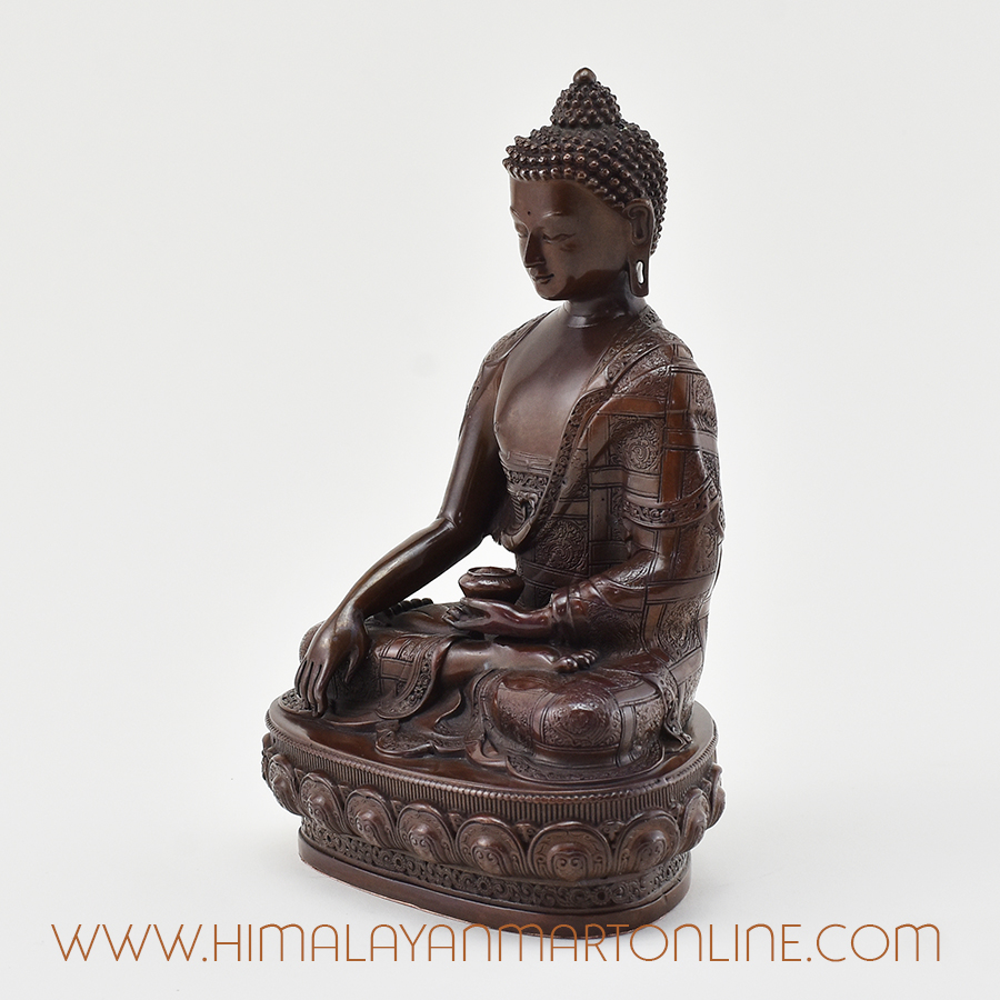 Left side view of Shakyamuni Buddha Figurine in oxidized copper