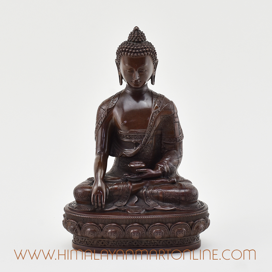 Front view of handcrafted Shakyamuni Buddha Figurine in oxidized copper