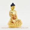 Right side of gold-plated Tibetan Medicine Buddha sculpture displaying detailed robe and posture.