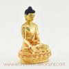Right side of gold-plated Tibetan Shakyamuni Buddha sculpture displaying intricate robe and posture.