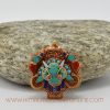 Top-down view of Chhepu Face Ghau ritual pendant necklace