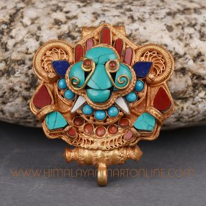 Front view of handcrafted Cheppu Face Ghau prayer box pendant