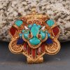 Top-down view of handcrafted Cheppu Face Ghau pendant