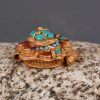 Right-side view of handcrafted Cheppu Face Ghau pendant