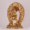 Left-side view of the handcrafted Black Dzambala statue, a Tibetan wealth deity figure.