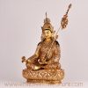 Left-side view of Guru Rinpoche handcrafted statue, Tibetan Padmasambhava deity figure.