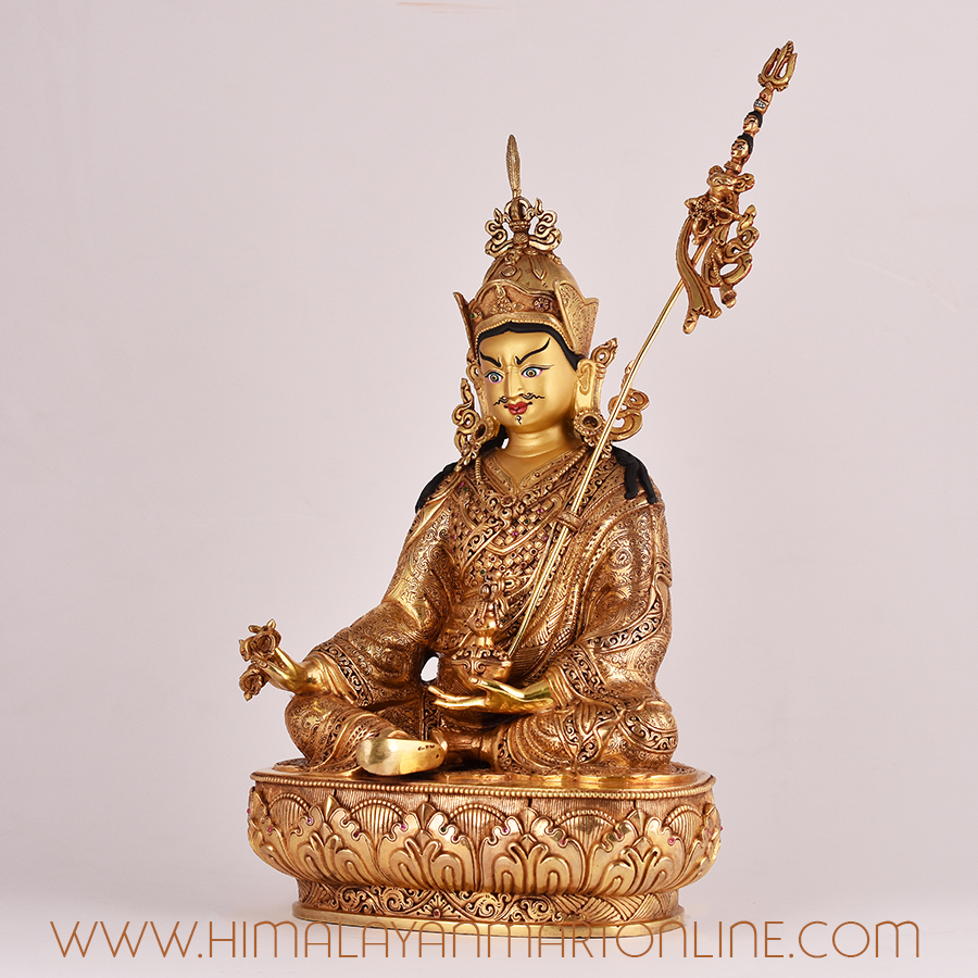 Left-side view of Guru Rinpoche handcrafted statue, Tibetan Padmasambhava deity figure.