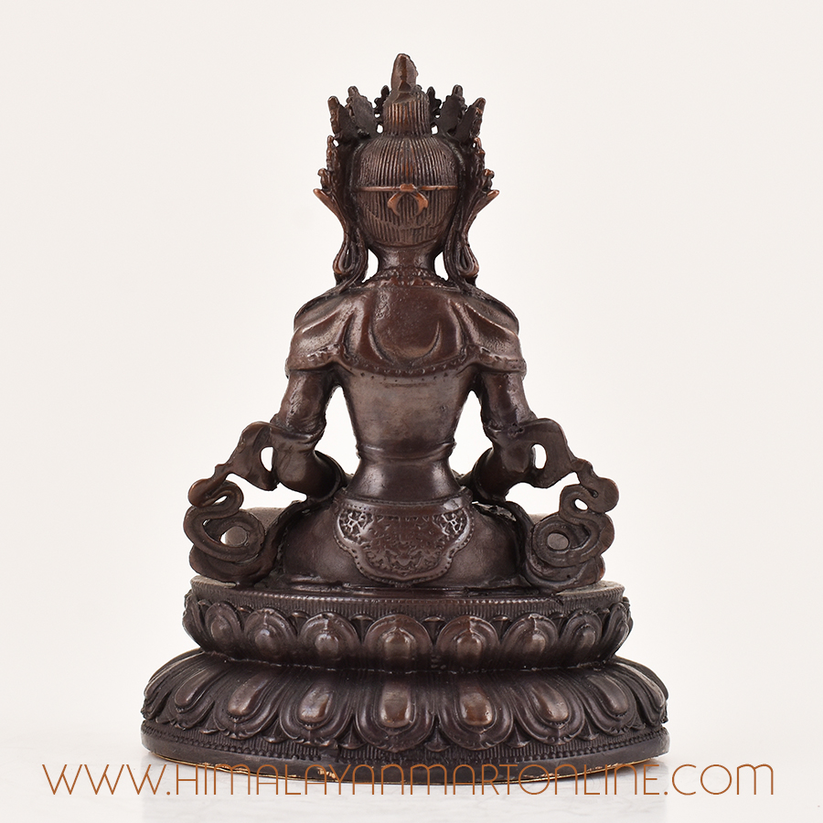 Back view of Amitayus statue, Tibetan Buddhist meditation sculpture revealing detailed craftsmanship and traditional metalwork