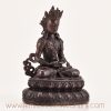 Right side view of handcrafted Amitayus statue, Tibetan Buddhist meditation sculpture with detailed robes and oxidized copper finish
