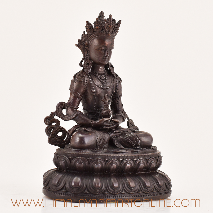 Right side view of handcrafted Amitayus statue, Tibetan Buddhist meditation sculpture with detailed robes and oxidized copper finish