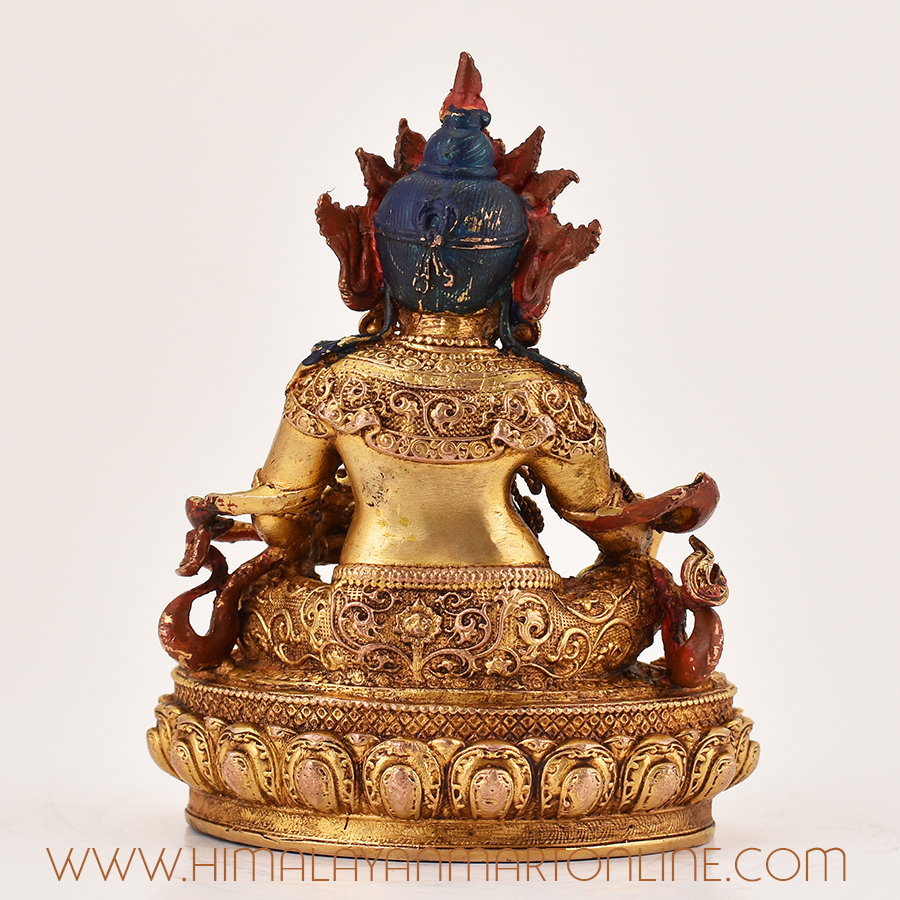Back view of Lapis Inlaid Yellow Dzambhala Statue showing traditional lost-wax copper craftsmanship