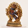 Left side view of a lapis inlay Hayagriva statue on a Tibetan Buddhist altar.