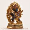 Right side view of a lapis inlay Hayagriva statue on a Tibetan Buddhist altar.