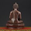 Back view of Amitabha Buddha Idol handcrafted in Nepal showing detailed carving and traditional finish.
