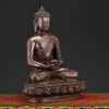 Right side view of Amitabha Buddha Idol handcrafted in Nepal showing detailed robe work and serene expression.