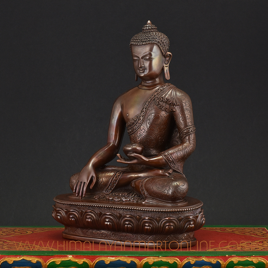 Left view of Shakyamuni Buddha Idol handcrafted in Nepal with lotus base and calm meditative presence.